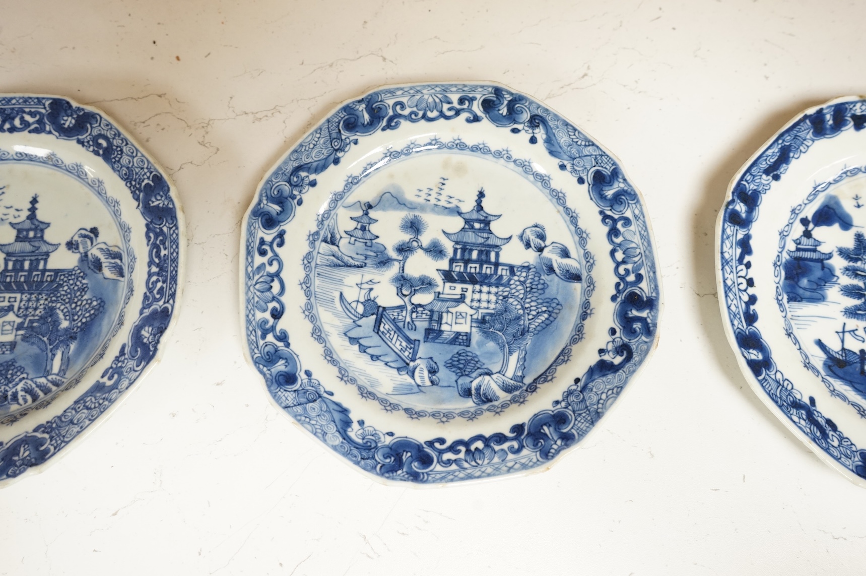 Three 18th century Chinese blue and white Export side plates, 19cm diameter